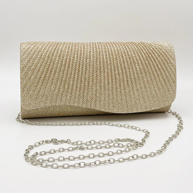 Clutch bag with sparkling studs and chain strap design