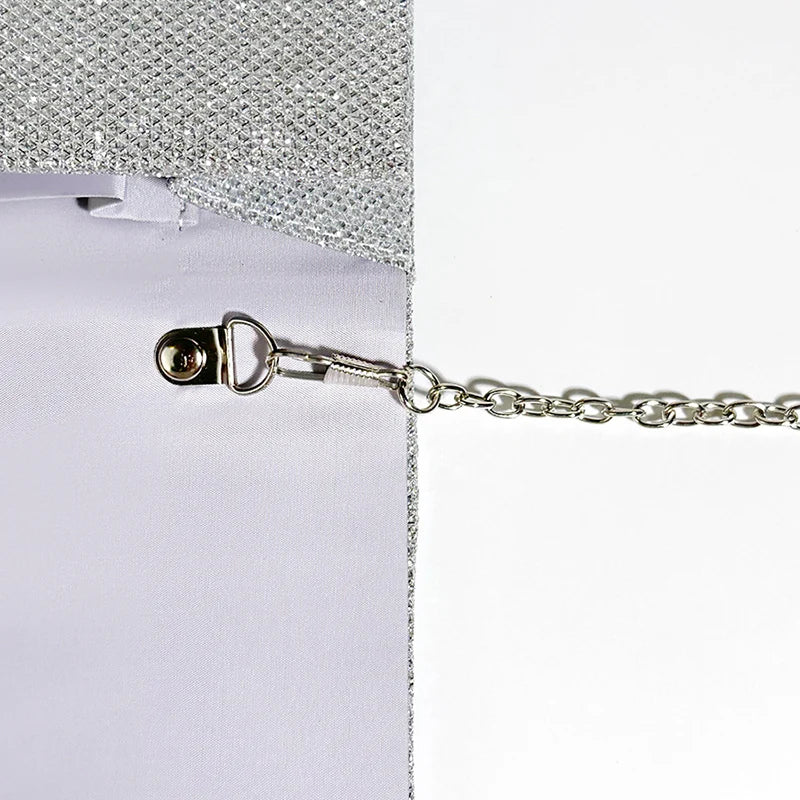 Clutch bag with sparkling studs and chain strap design