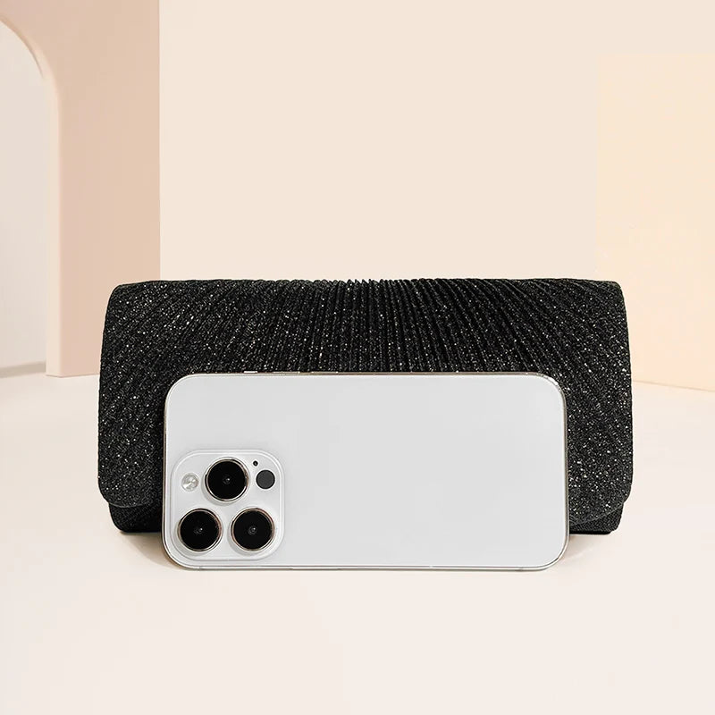 Clutch bag with sparkling studs and chain strap design