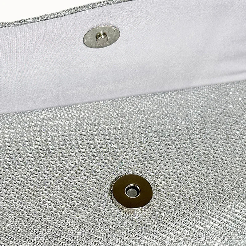 Clutch bag with sparkling studs and chain strap design