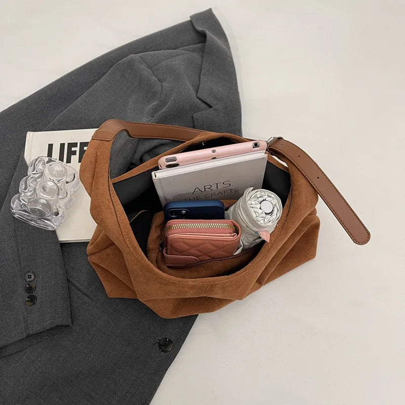 Suede bag with retro design