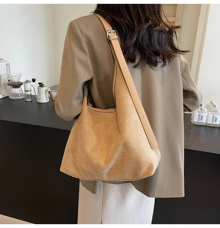 Suede bag with retro design