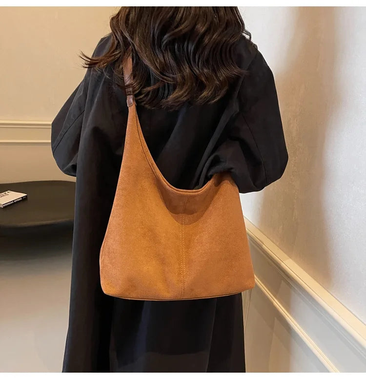 Suede bag with retro design