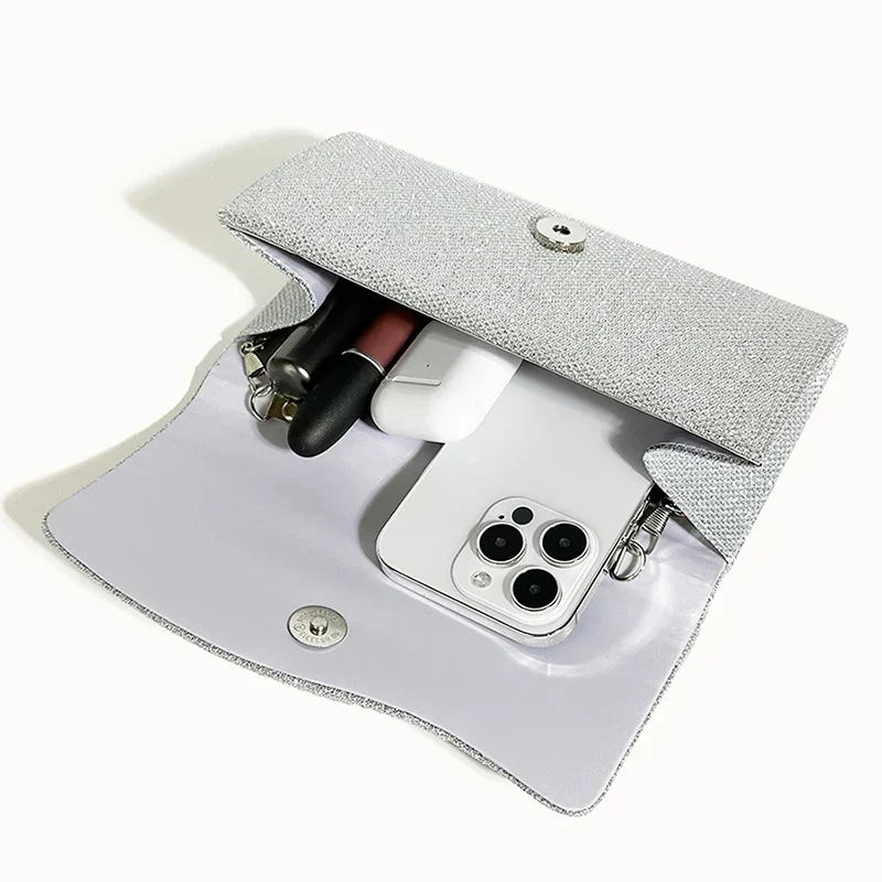 Clutch bag with sparkling studs and chain strap design