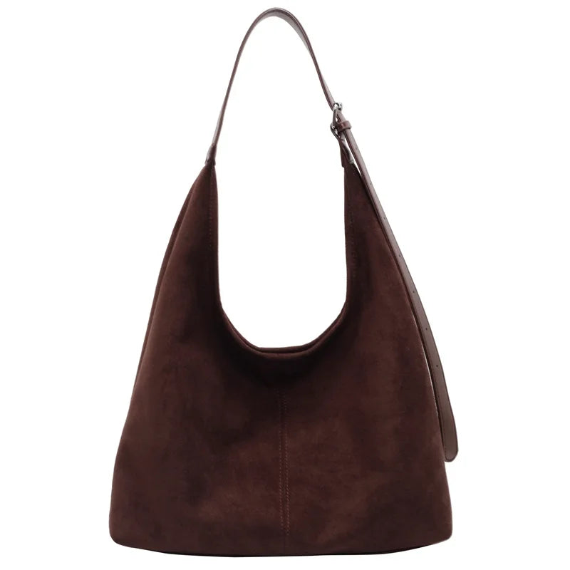 Suede bag with retro design