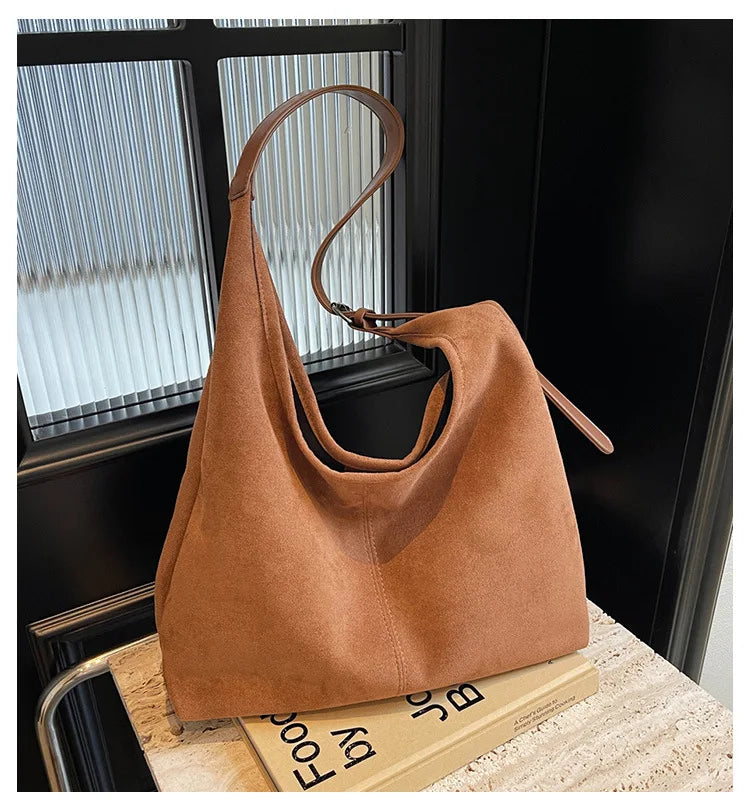 Suede bag with retro design